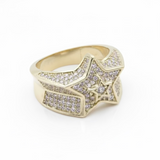 Gold ring with diamond accents on a white background

